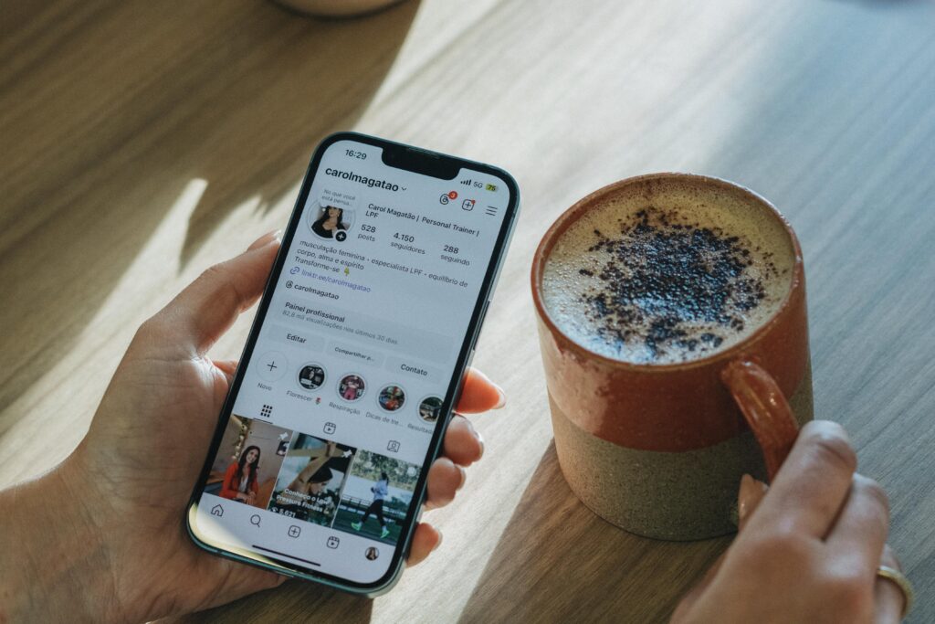 pexels photo 33464098 33464098 Person browsing Instagram over coffee, relaxed morning vibe.